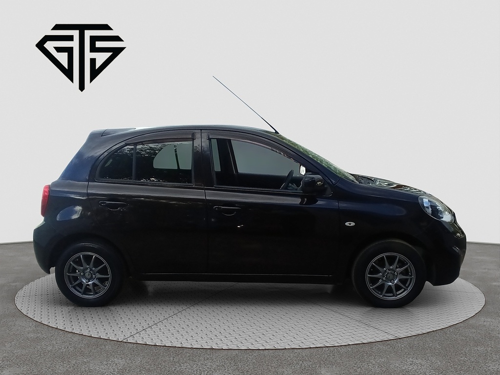 Nissan  Hatchback White #2