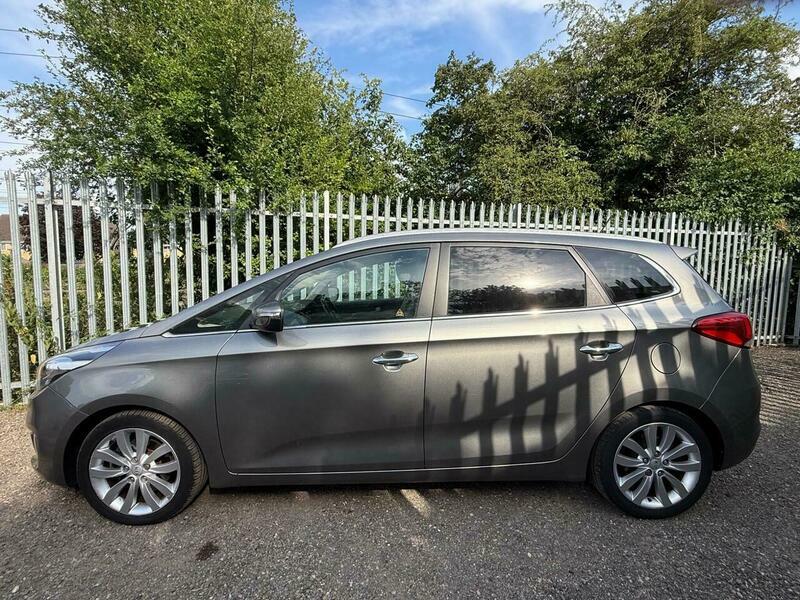 Kia Carens 2 Silver #10