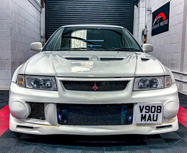 Mitsubishi Lancer Evolution VI Black #8