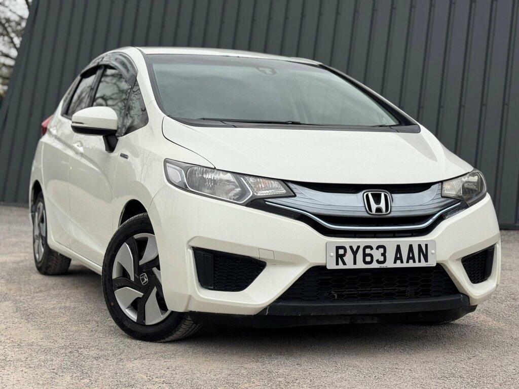 Honda Jazz Hatchback 1.3 H Ima Hs 2013 Blue #1