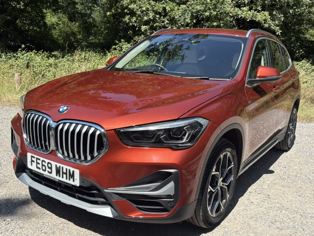 BMW X1 Sdrive18i Xline Orange #4