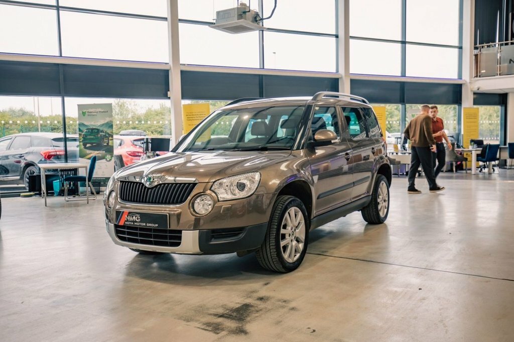 Skoda Yeti Hatchback 2.0 Beige #10