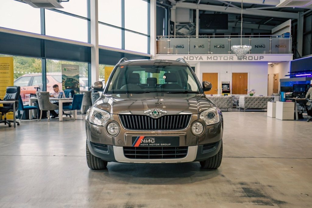 Skoda Yeti Hatchback 2.0 Beige #9