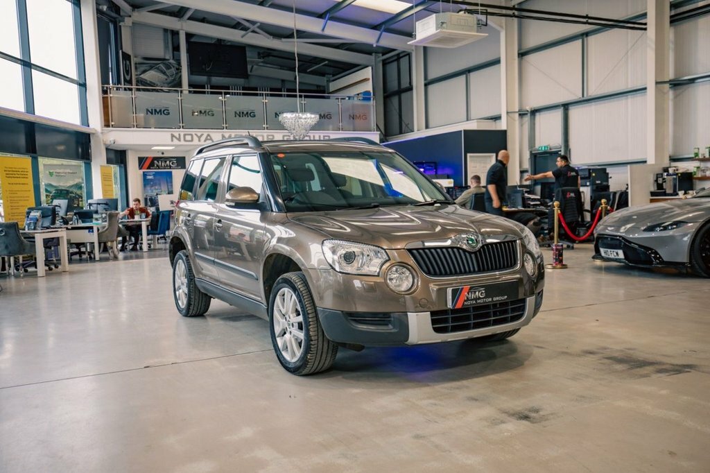 Skoda Yeti Hatchback 2.0 Beige #8