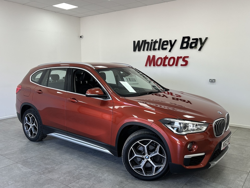 BMW X1 18D Xline Orange