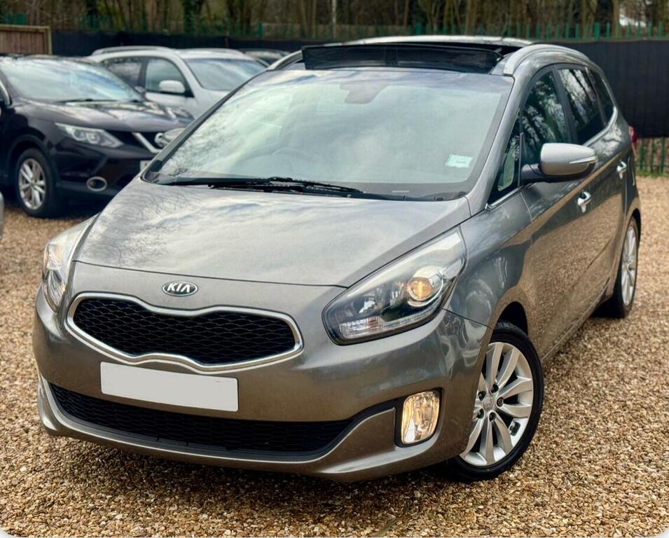 Kia Carens 2 Silver #11