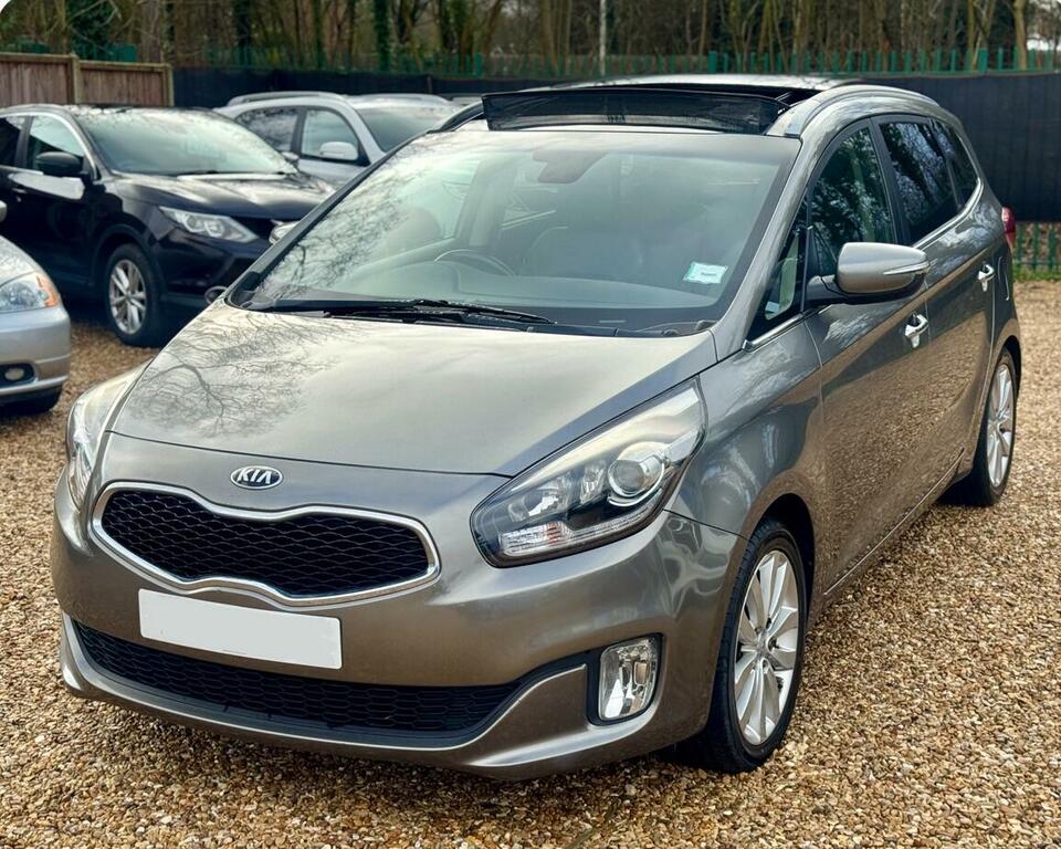 Kia Carens 2 Silver #9