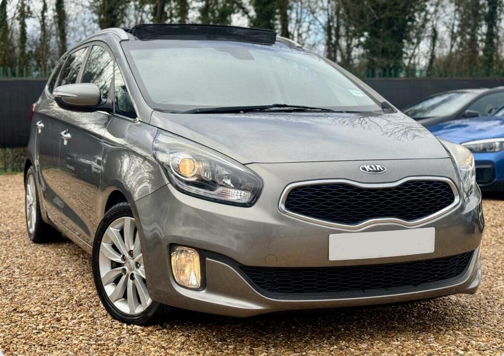 Kia Carens 2 Silver #13