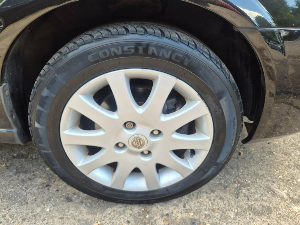 Nissan Almera 1.5 Se Black #4