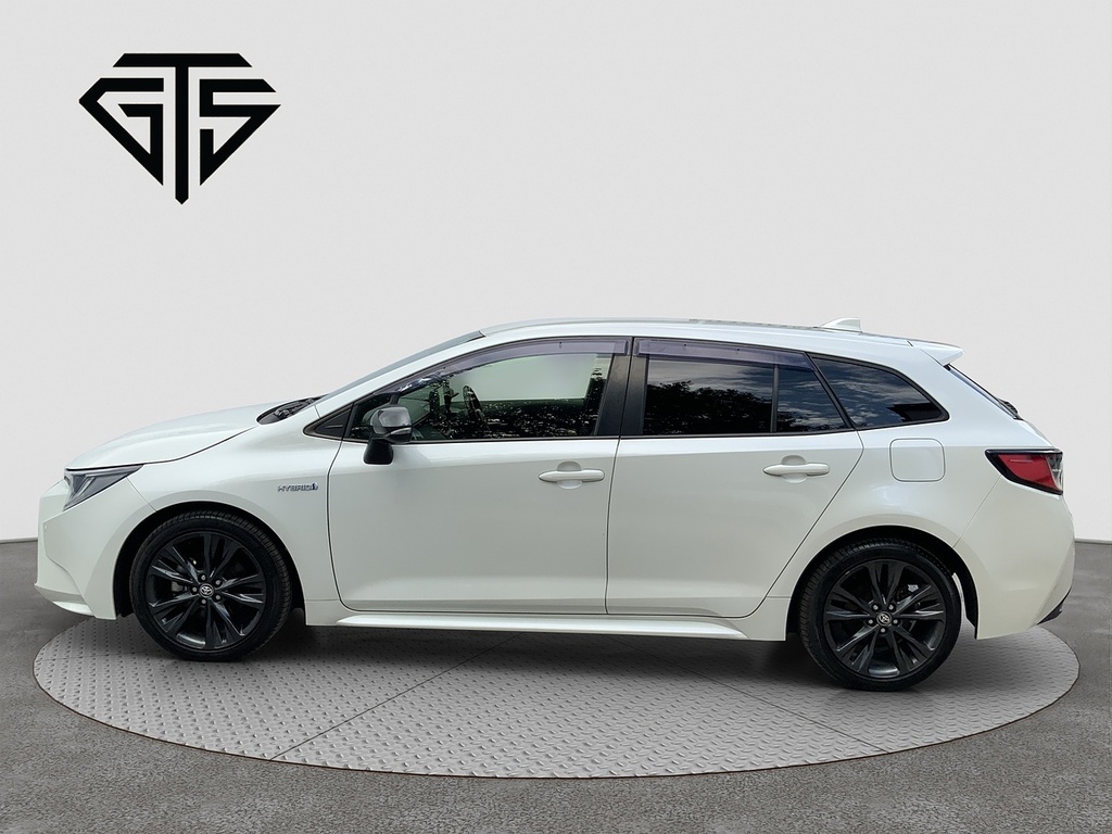 Toyota Corolla Hybrid Wxb DX70EHG White #6