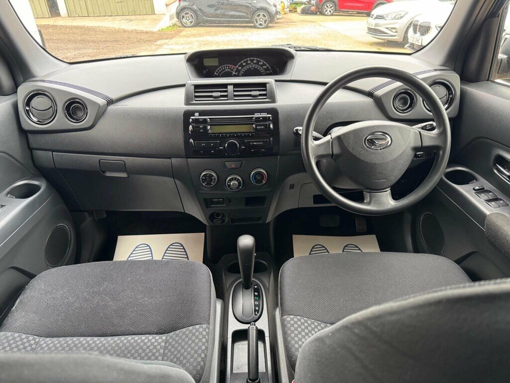 Daihatsu Materia  Silver #23