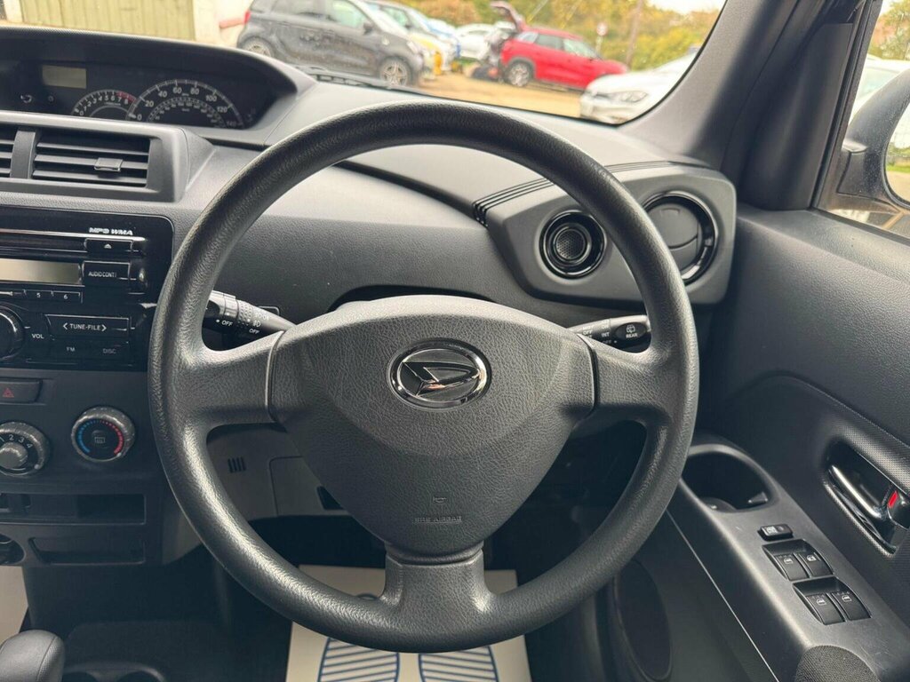 Daihatsu Materia  Silver #24